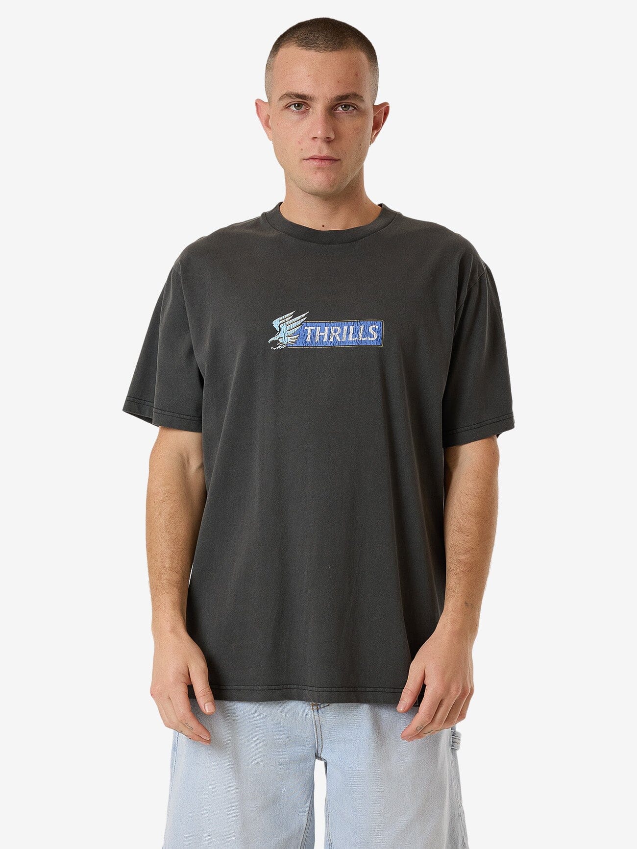 Male model wearing our Thrills standing against a plain studio background.